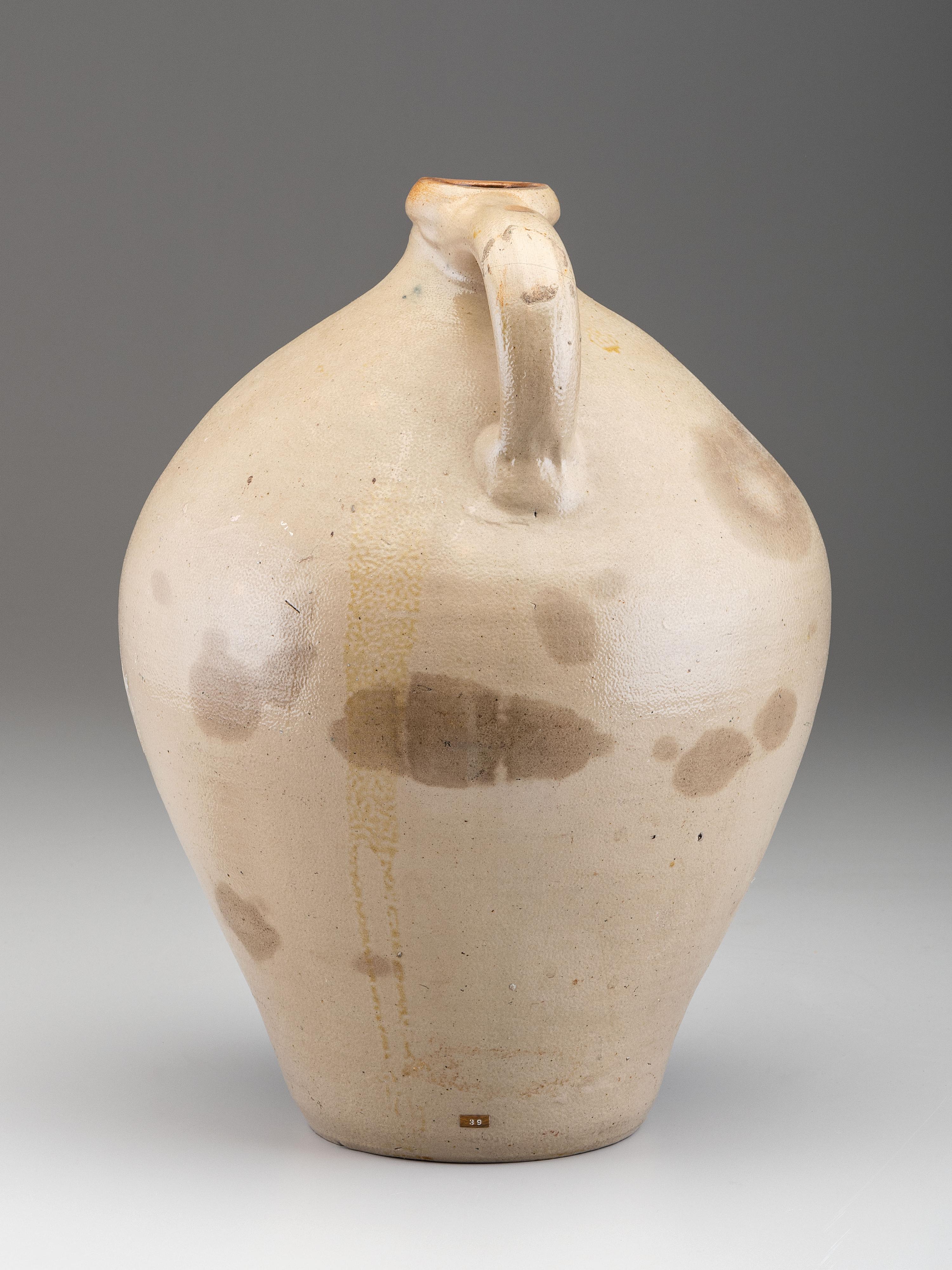 A Cobalt Decorated Stoneware Merchant's Jug