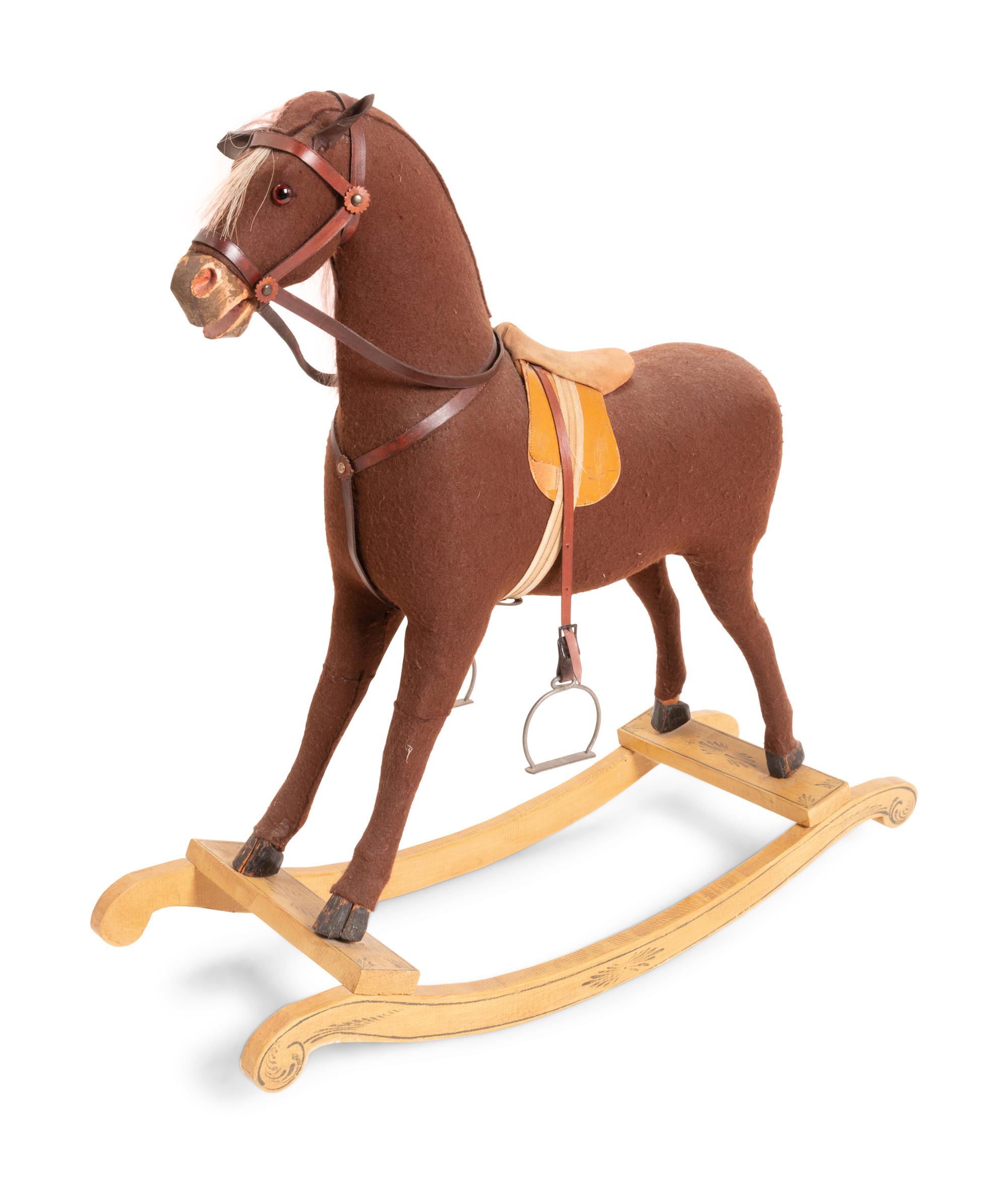A Child's Stuffed Felt and Carved Wood Rocking Horse