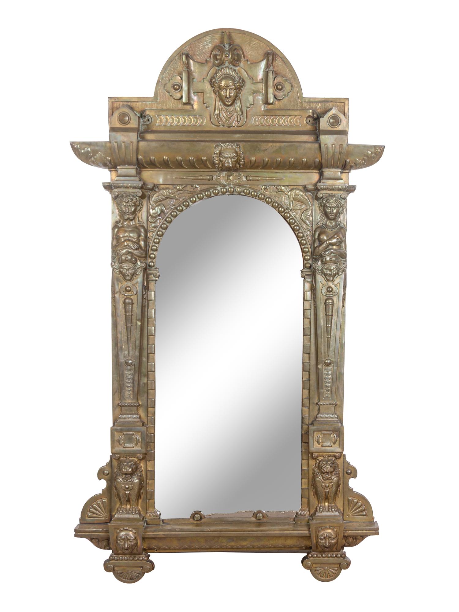 A Renaissance Revival Pressed Brass Mirror
