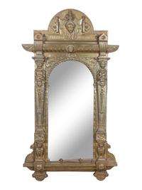 A Renaissance Revival Pressed Brass Mirror