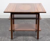 A Georgian Style Mahogany Drop-leaf Table Height 27 x width 16 x depth 27 1/2 inches (closed).