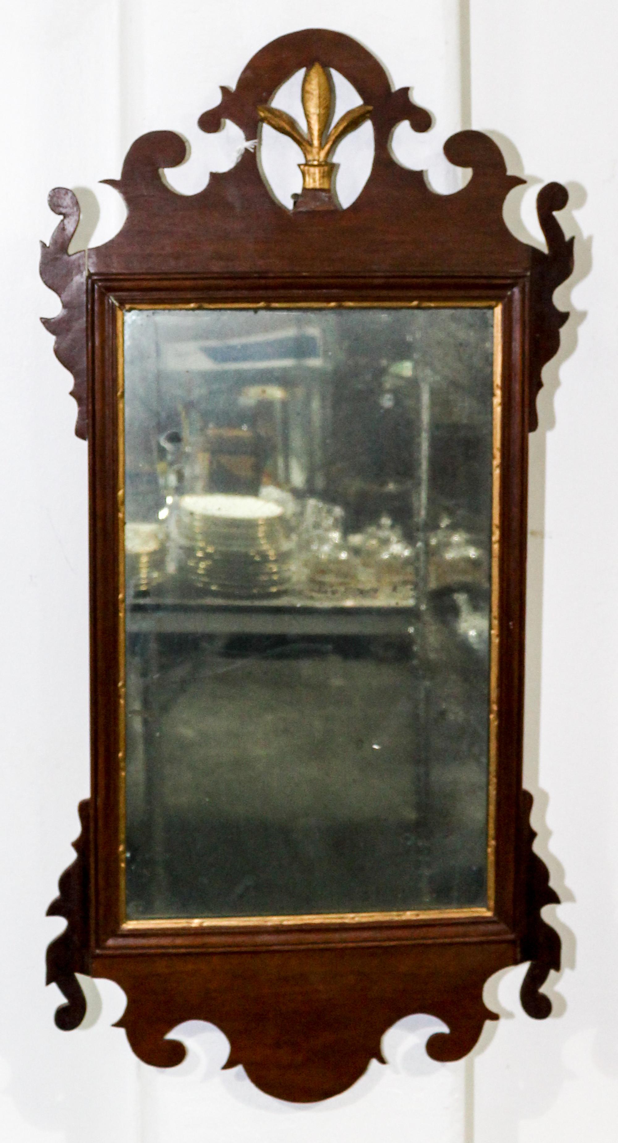A Chippendale Mahogany Parcel-Gilt Mirror Height 30 x width 14 1/4 inches. — 19TH CENTURY