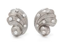 A Pair of White Gold and Diamond Seashell Earclips, 8.30 dwts.