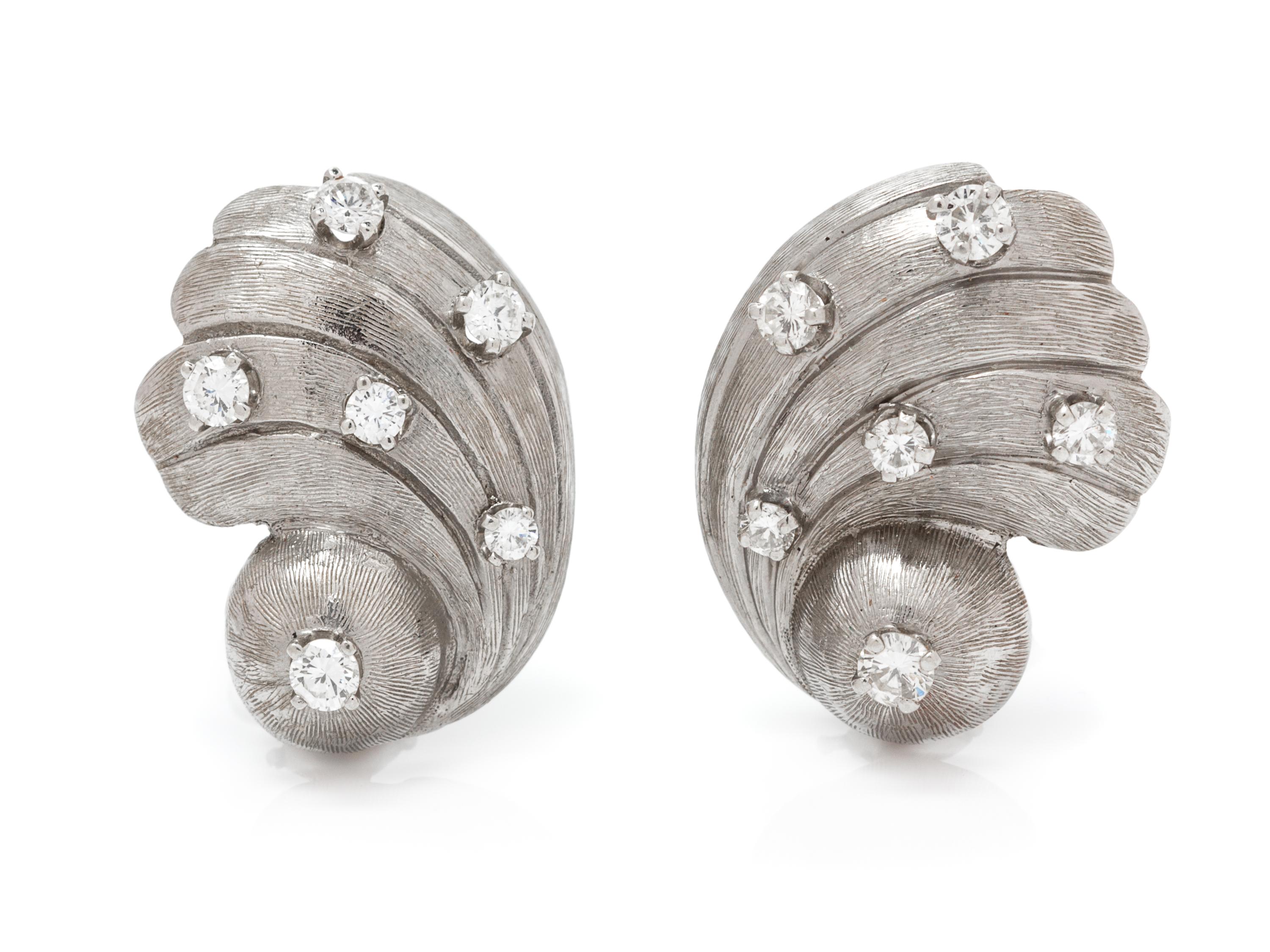 A Pair of White Gold and Diamond Seashell Earclips, 8.30 dwts.