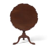 A Chippendale Carved Mahogany Tilt-Top Pie-Crust Tea Table