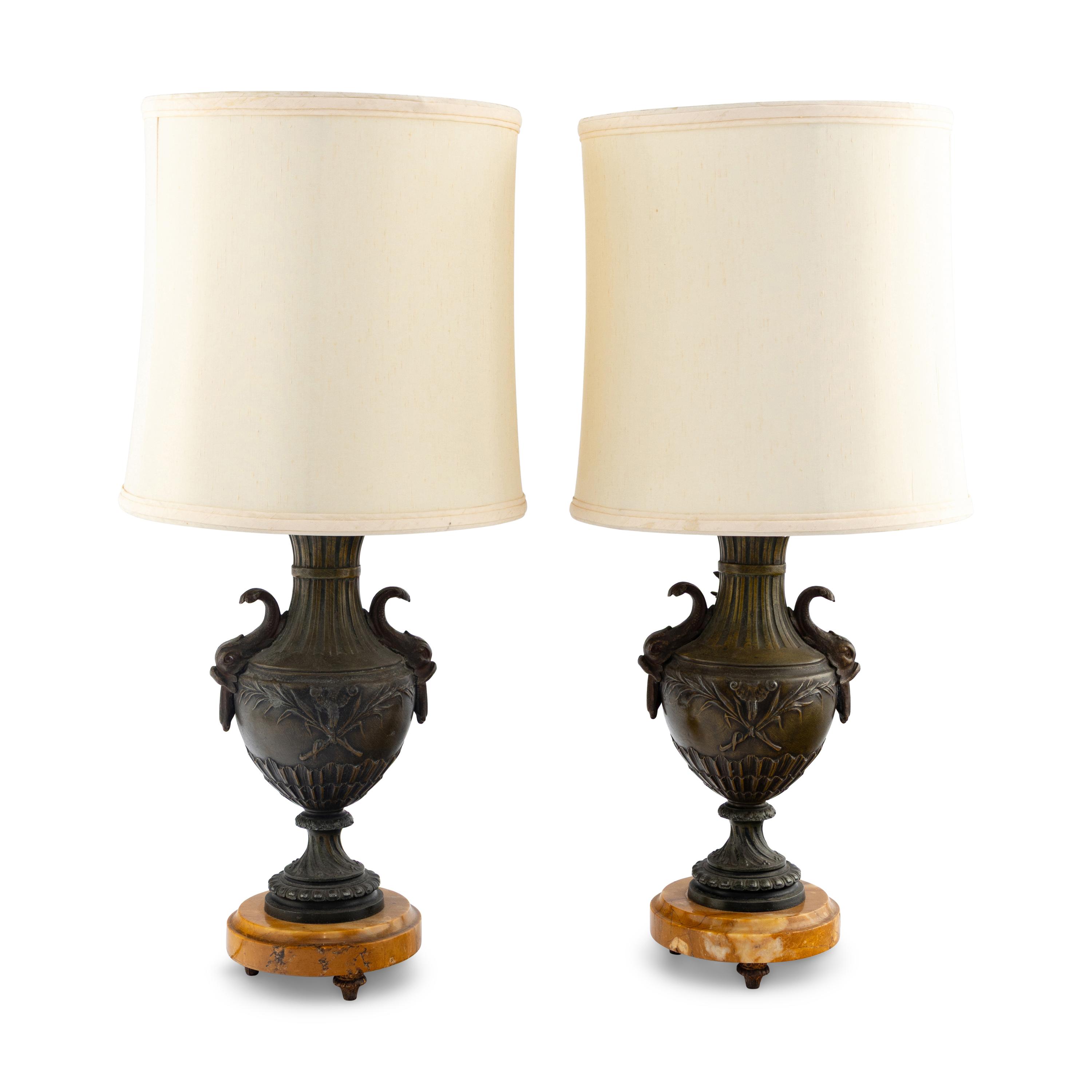 A Pair of French Cast Metal and Marble Lamps