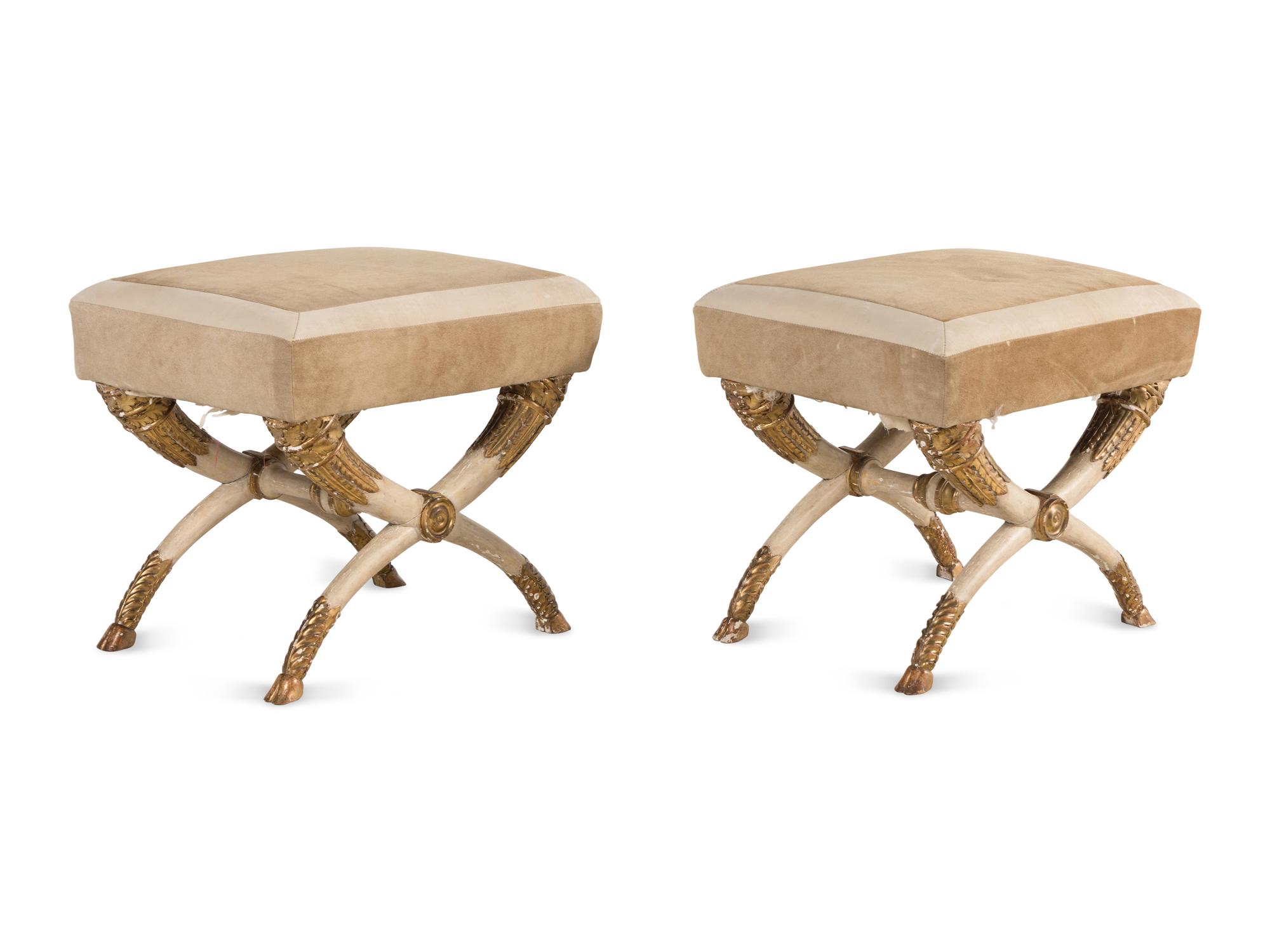 A Pair of Italian Cream-Painted and Parcel Gilt Curule-Form Stools