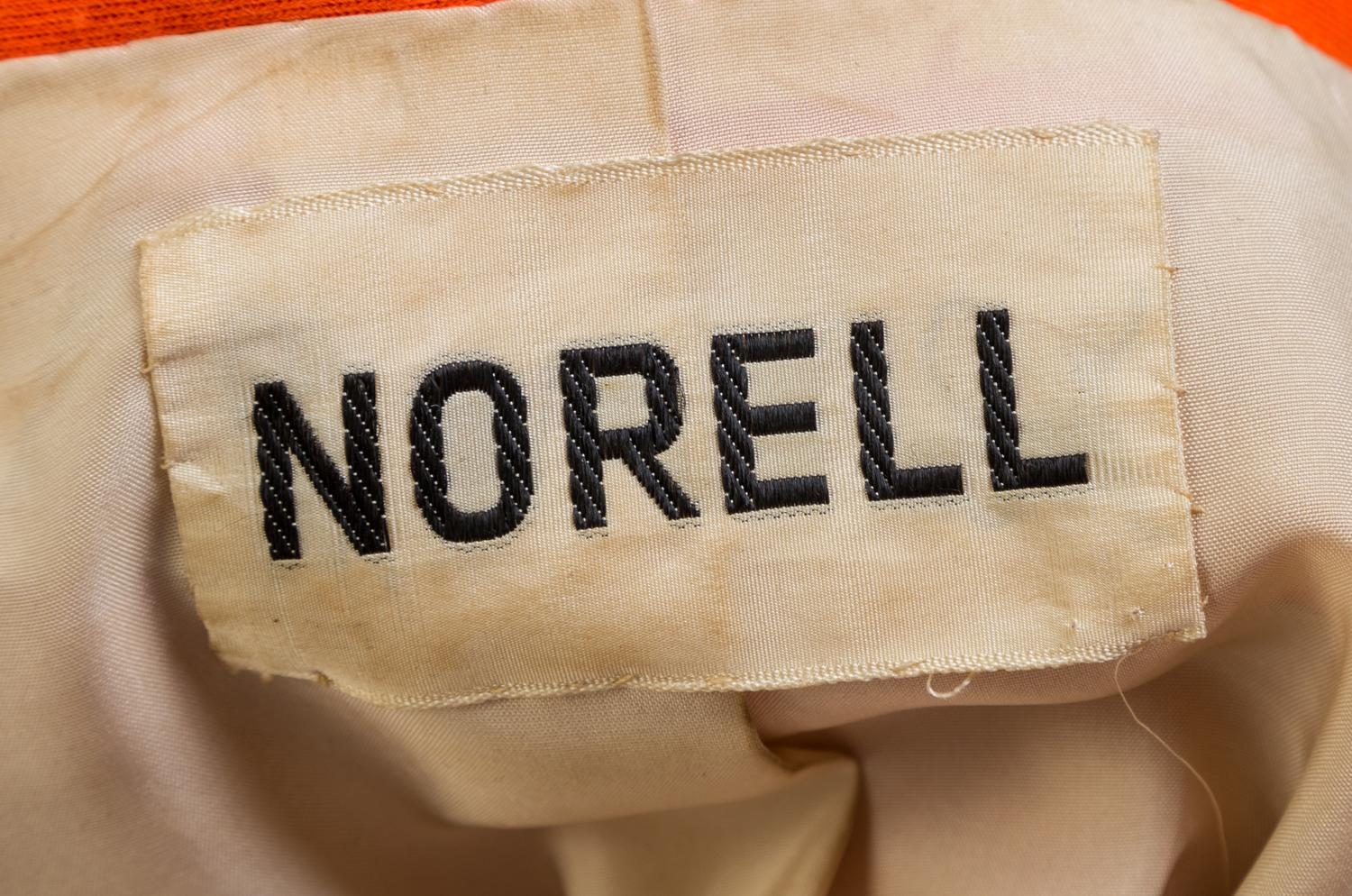 A Norell 1960s Orange Wool Jacket, No size; Belt: 6.5" x 75".