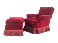 A Velvet-Upholstered Lounge Chair and Ottoman with Bullion Fringe