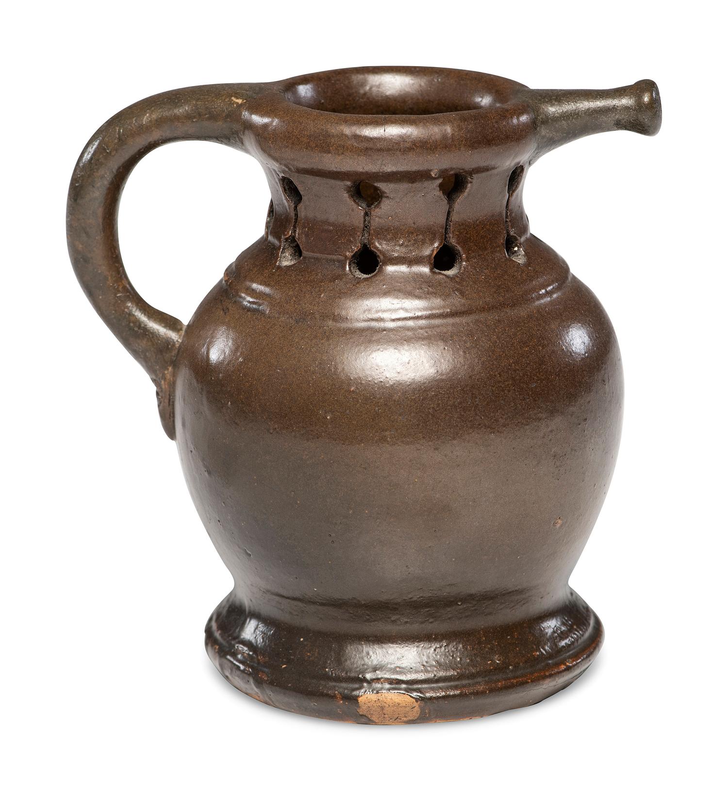 A Rare William Rowley Slip-Glazed Puzzle Jug