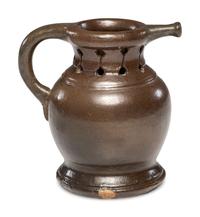 A Rare William Rowley Slip-Glazed Puzzle Jug