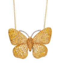 An 18 Karat Bicolor Gold, Diamond and Colored Diamond Butterfly Pendant/Brooch, 14.00 dwts.
