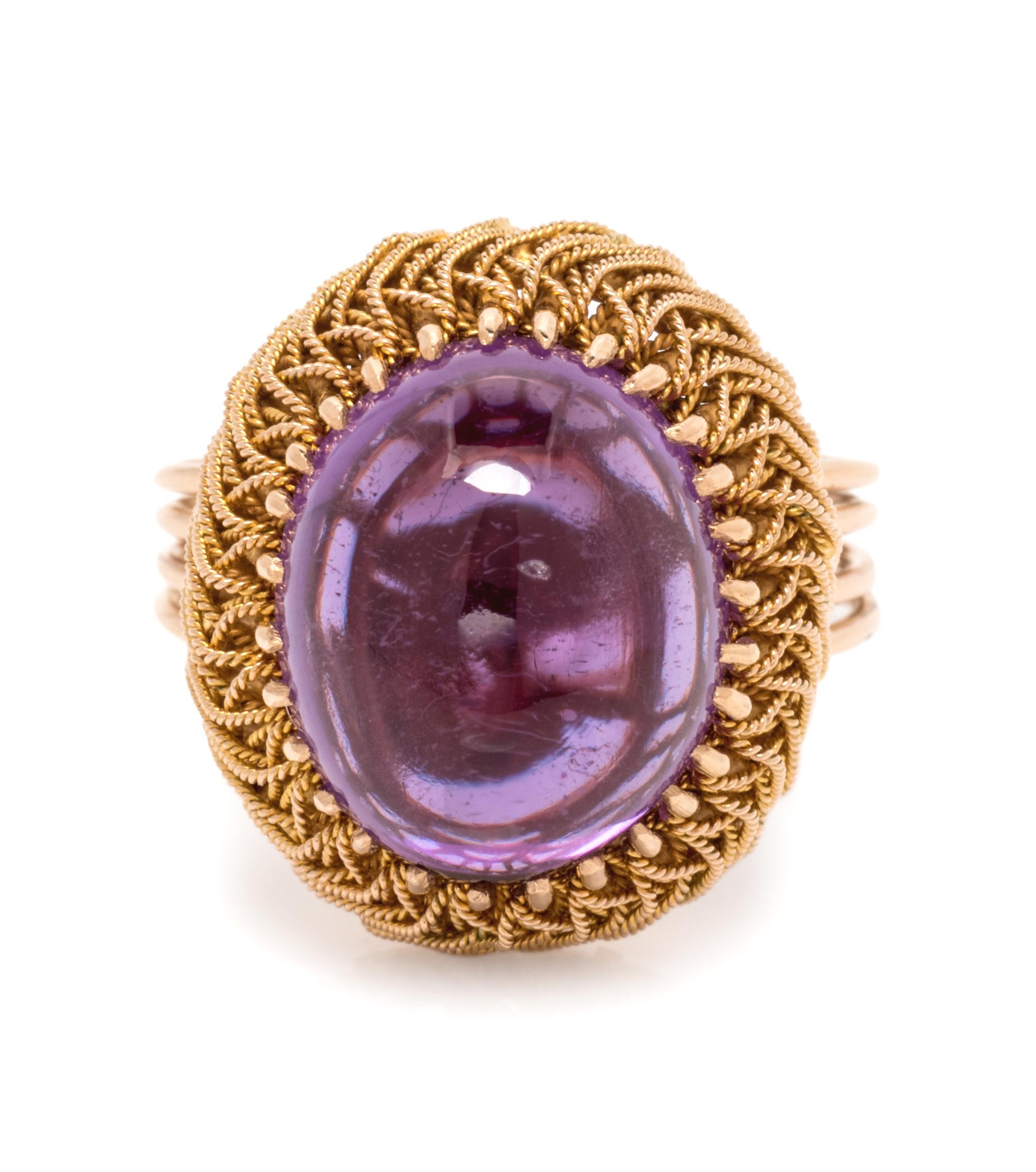 A Yellow Gold and Glass Ring,