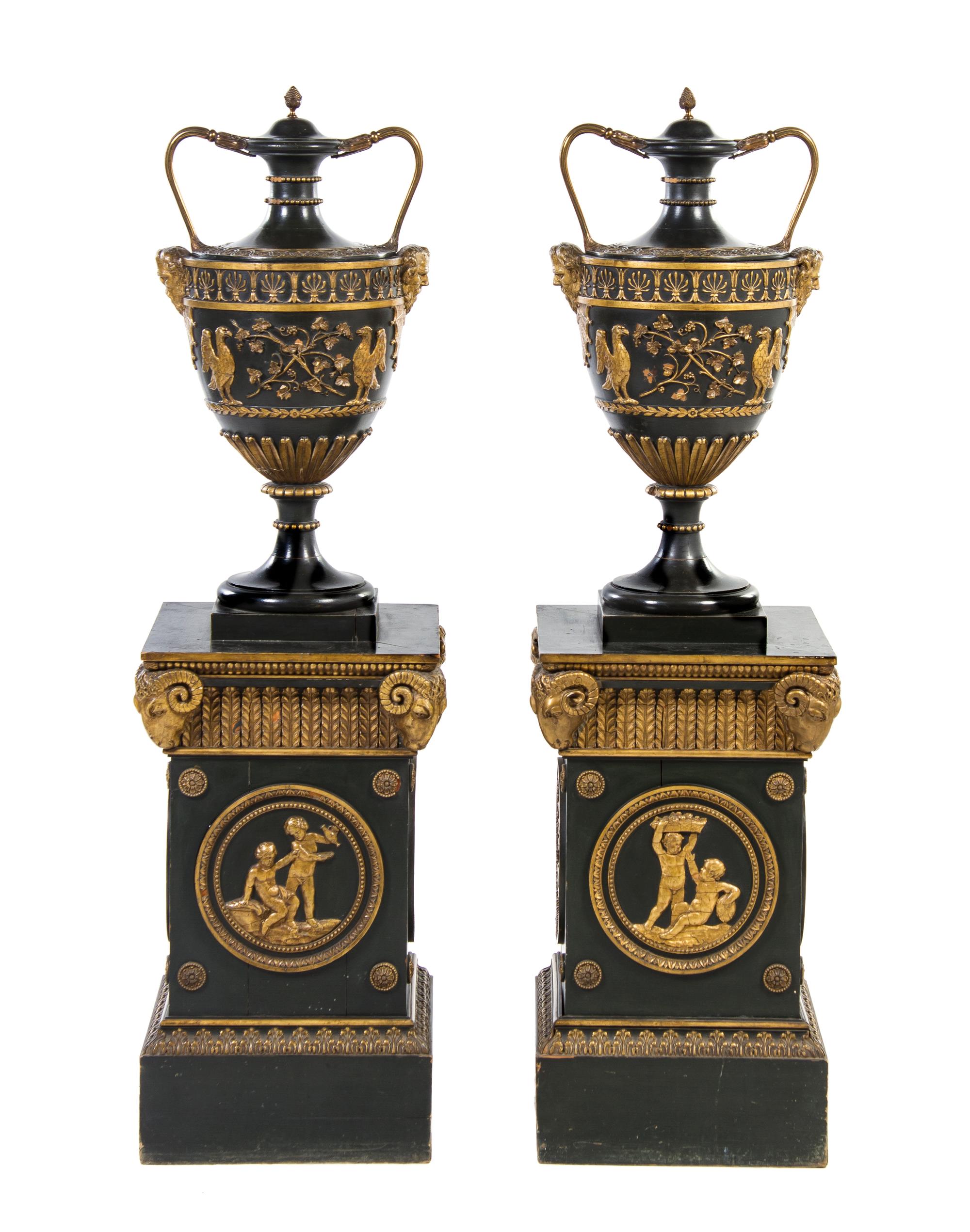 A Pair of Adam Style Urns on Pedestals, Height 57 x width 16 x depth 16 inches.