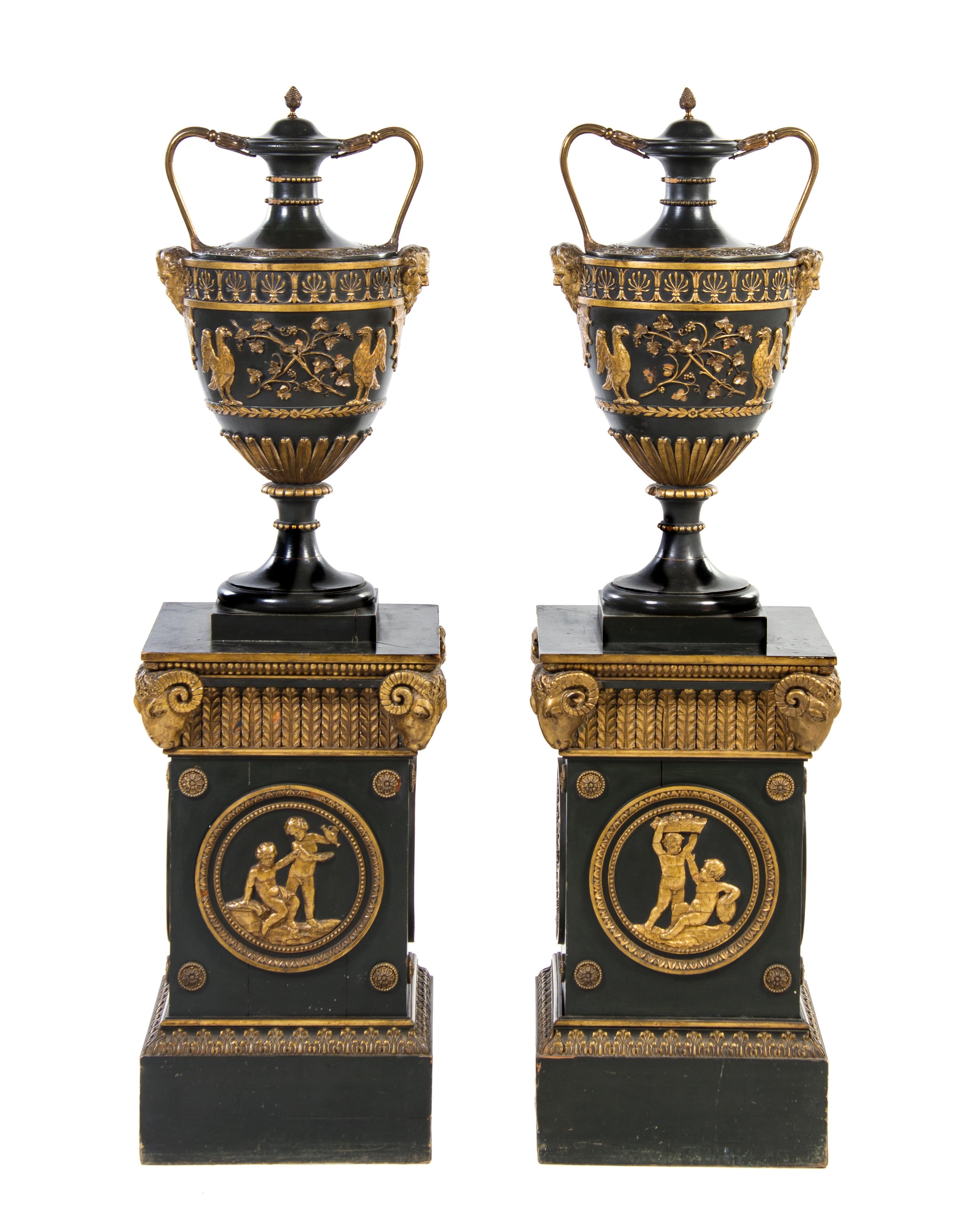 A Pair of Adam Style Urns on Pedestals, Height 57 x width 16 x depth 16 inches.