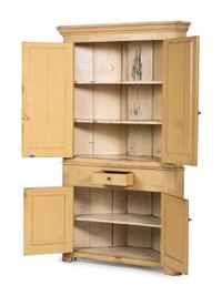 A Federal Yellow Painted Poplar or Pine Corner Cupboard