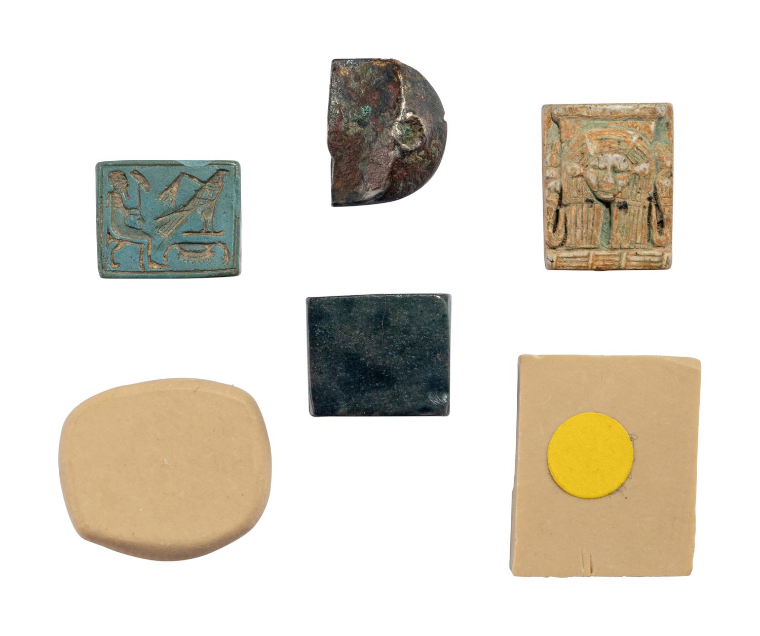 Four Egyptian Faience, Stone, and Metal Plaques with Hieroglyphs