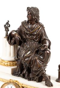 A French Gilt and Patinated Bronze Mounted Marble Mantel Clock