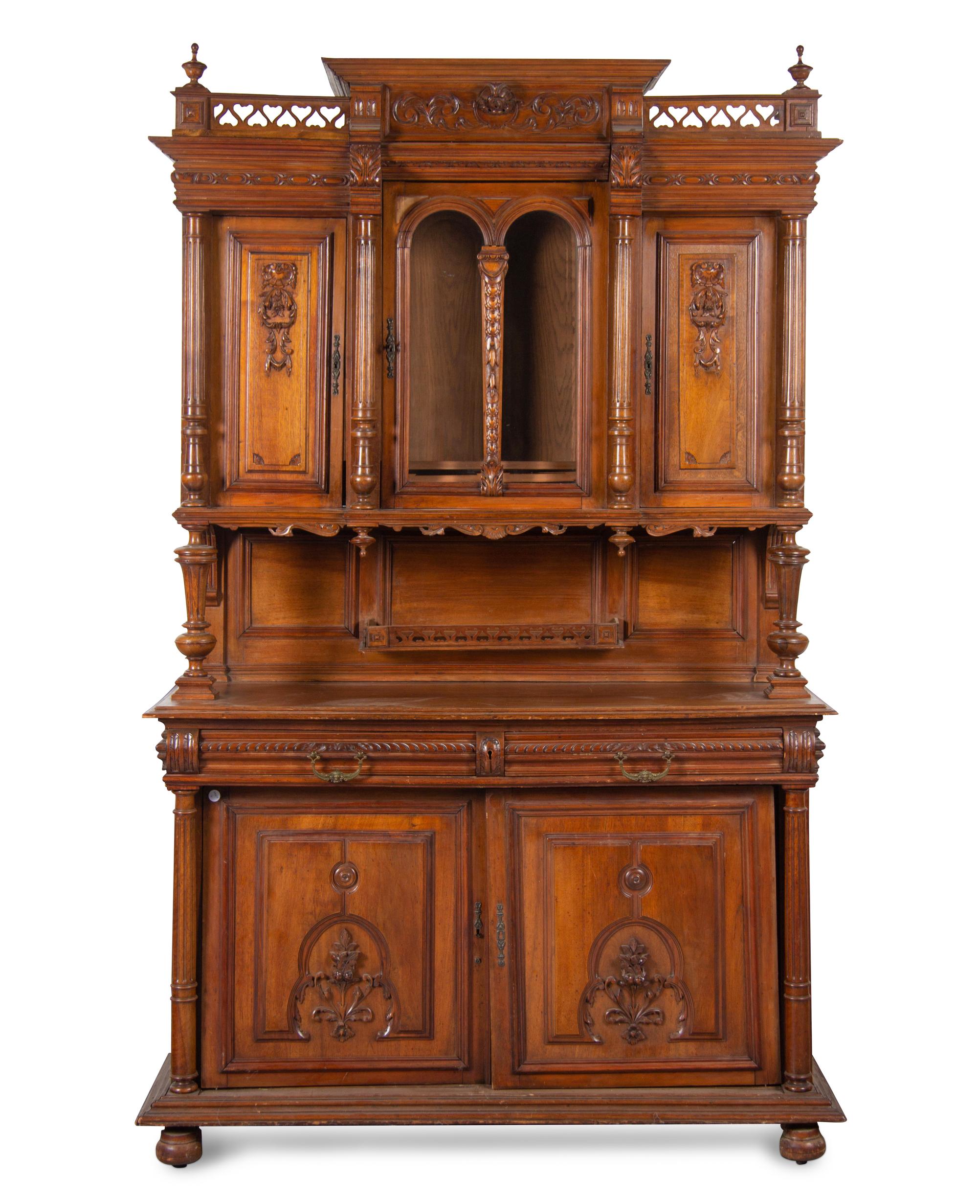 A Renaissance Revival Carved Walnut Serving Cabinet