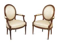 A Pair of Louis XVI Walnut Fauteuils en Cabriolet