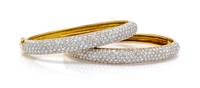 A Pair of 18 Karat Yellow Gold and Diamond Bangle Bracelets, 32.70 dwts.