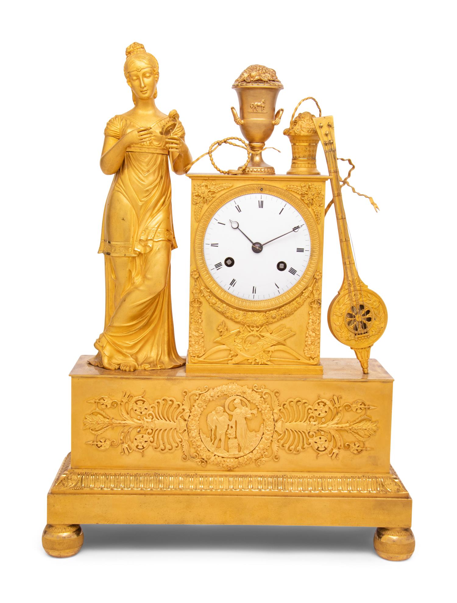 An Empire Gilt Bronze Musical Clock