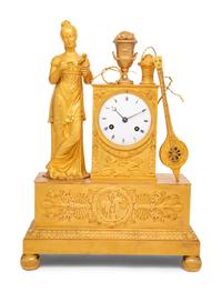 An Empire Gilt Bronze Musical Clock