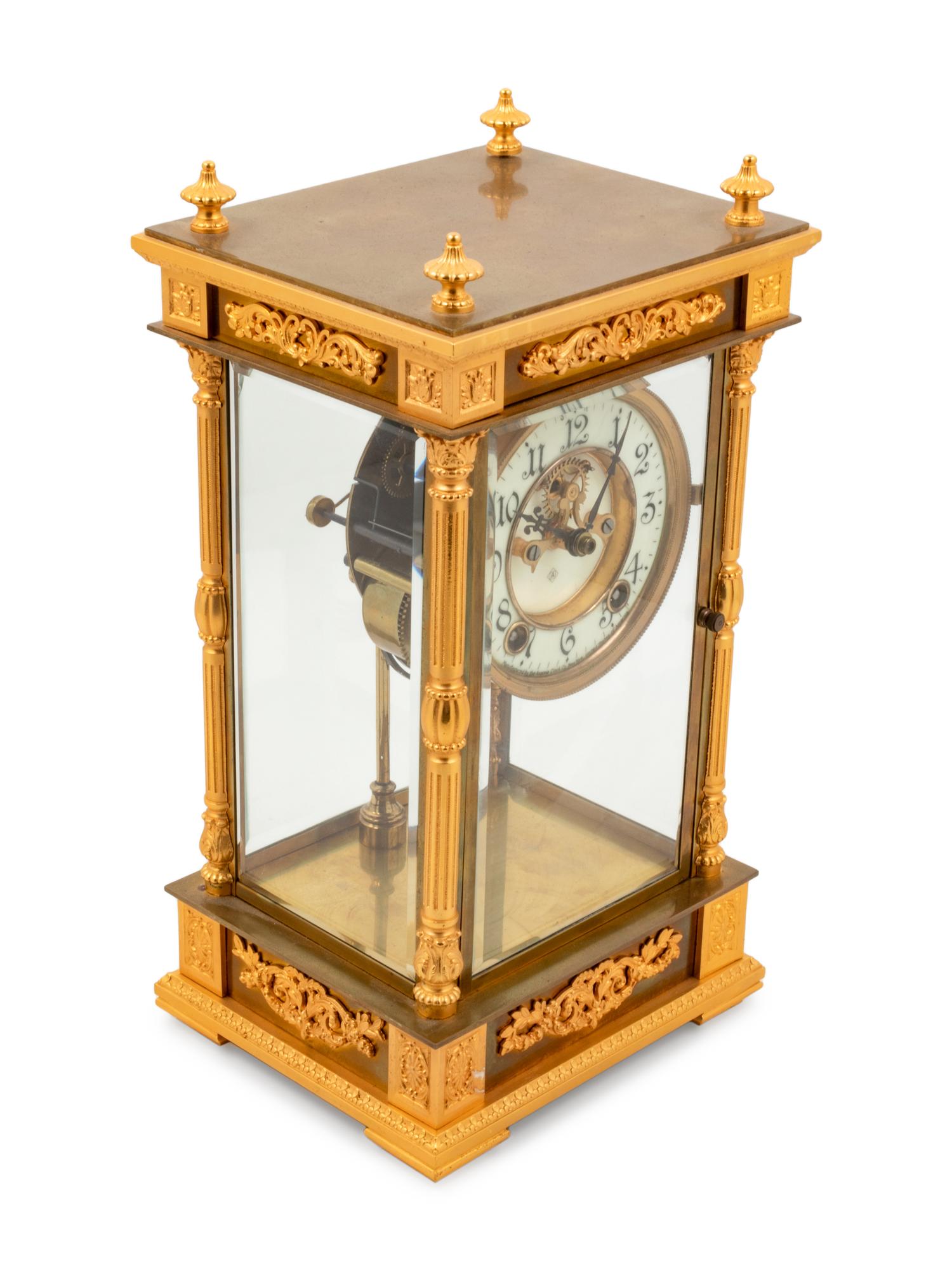 An Ansonia Earl Gilt Metal and Crystal Regulator Clock