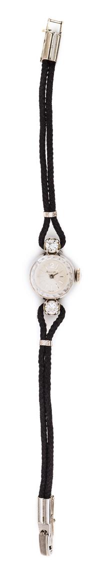 A 14 Karat White Gold and Diamond Wristwatch,