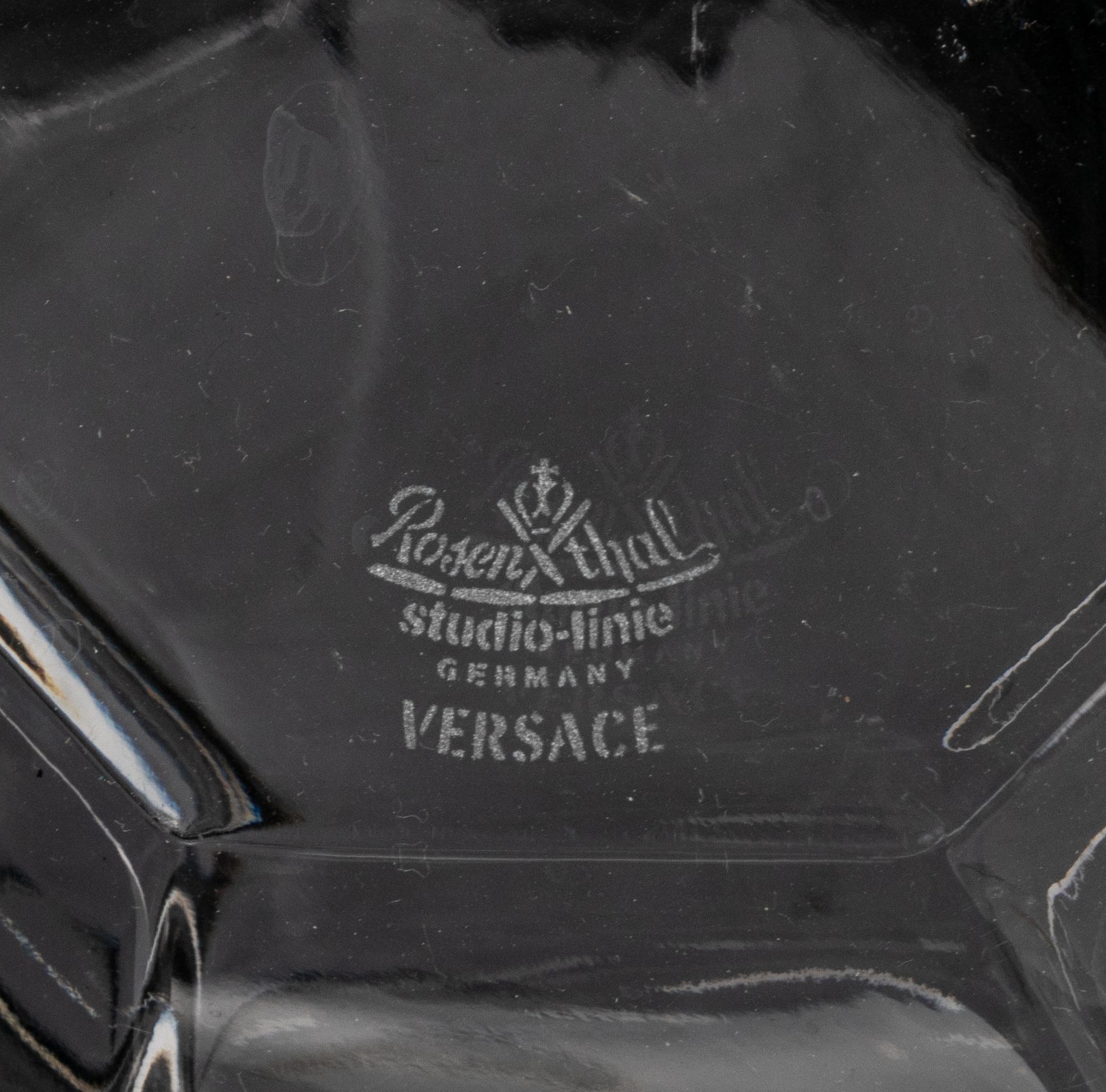 A Group of Versace Medusa Lumiere Glass Articles