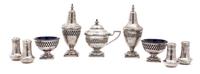 A Group of Eight Salt and Pepper Shakers Height 4 inches.