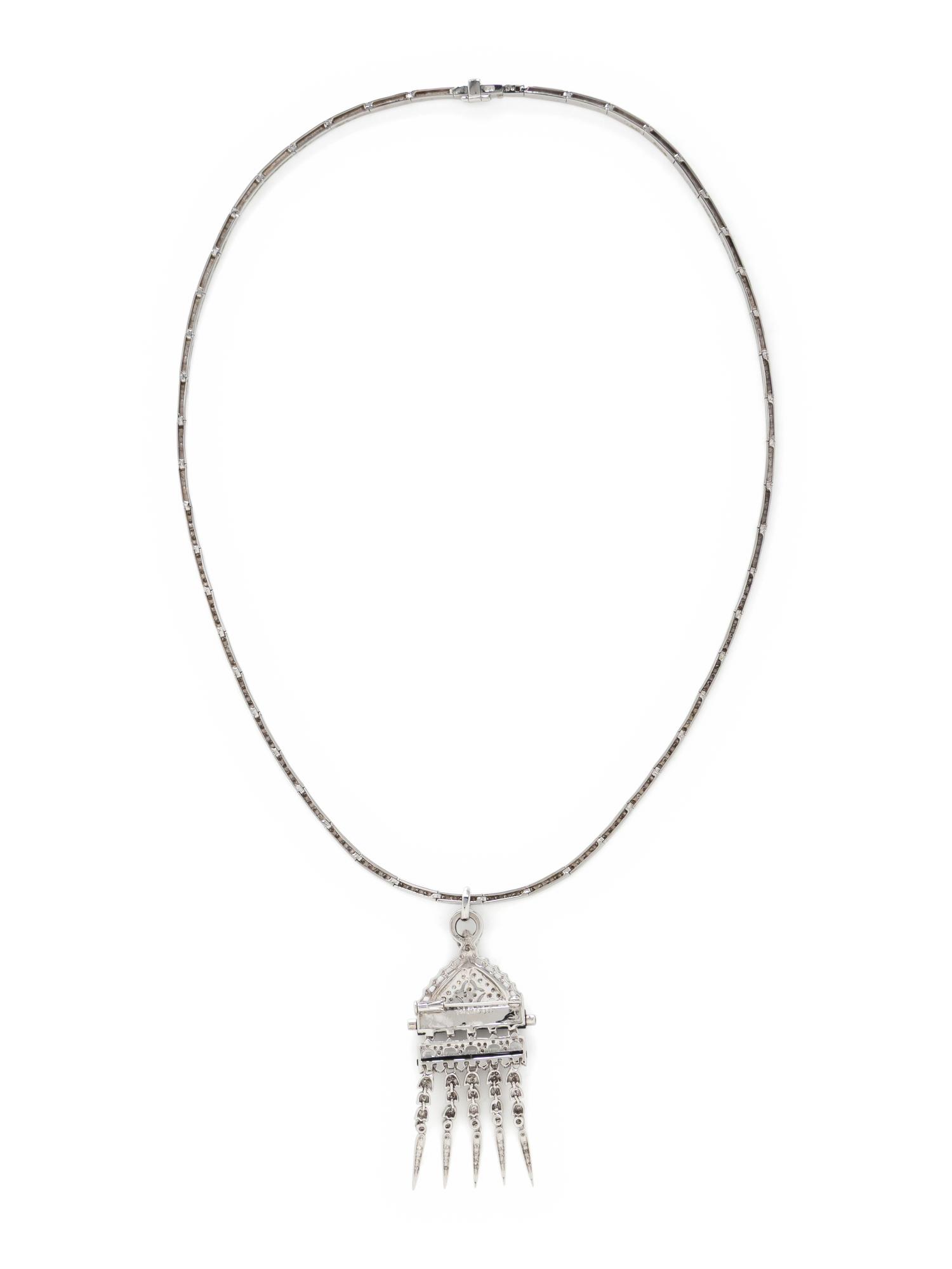 DIAMOND, BLACK ONYX, AND WHITE GOLD PENDANT NECKLACE