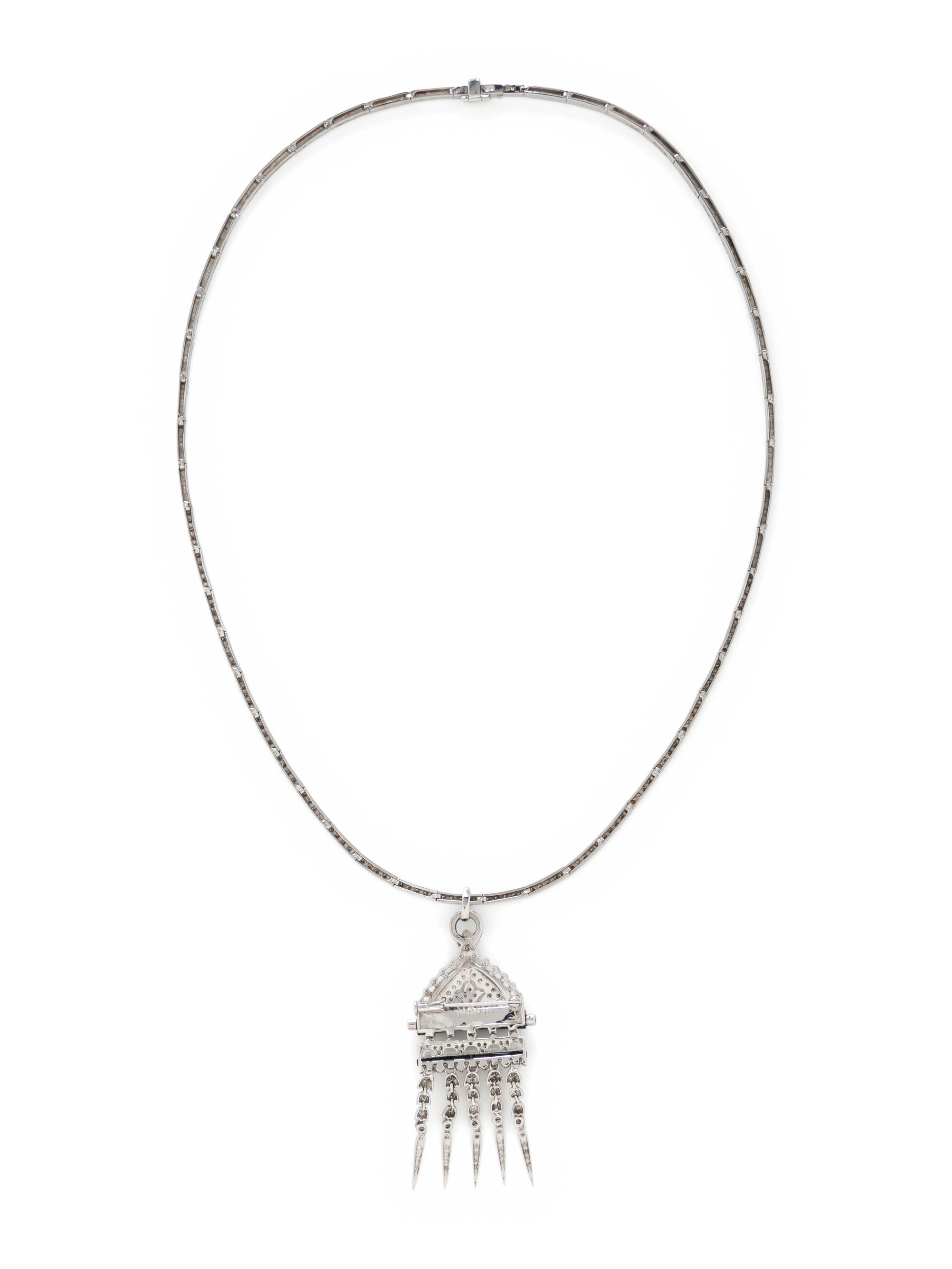 DIAMOND, BLACK ONYX, AND WHITE GOLD PENDANT NECKLACE