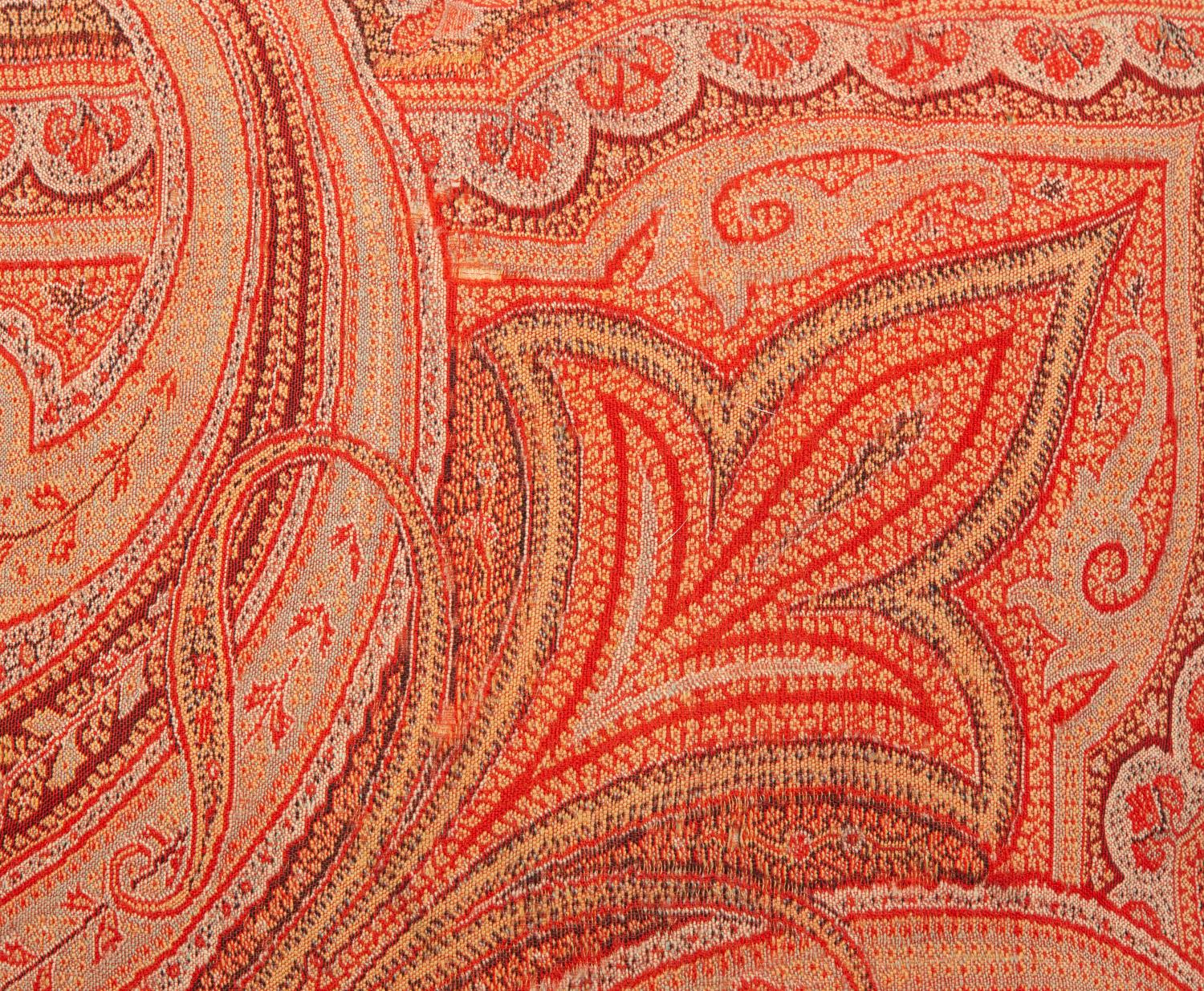 Four Paisley Covered Pillows with Black Braid Trim