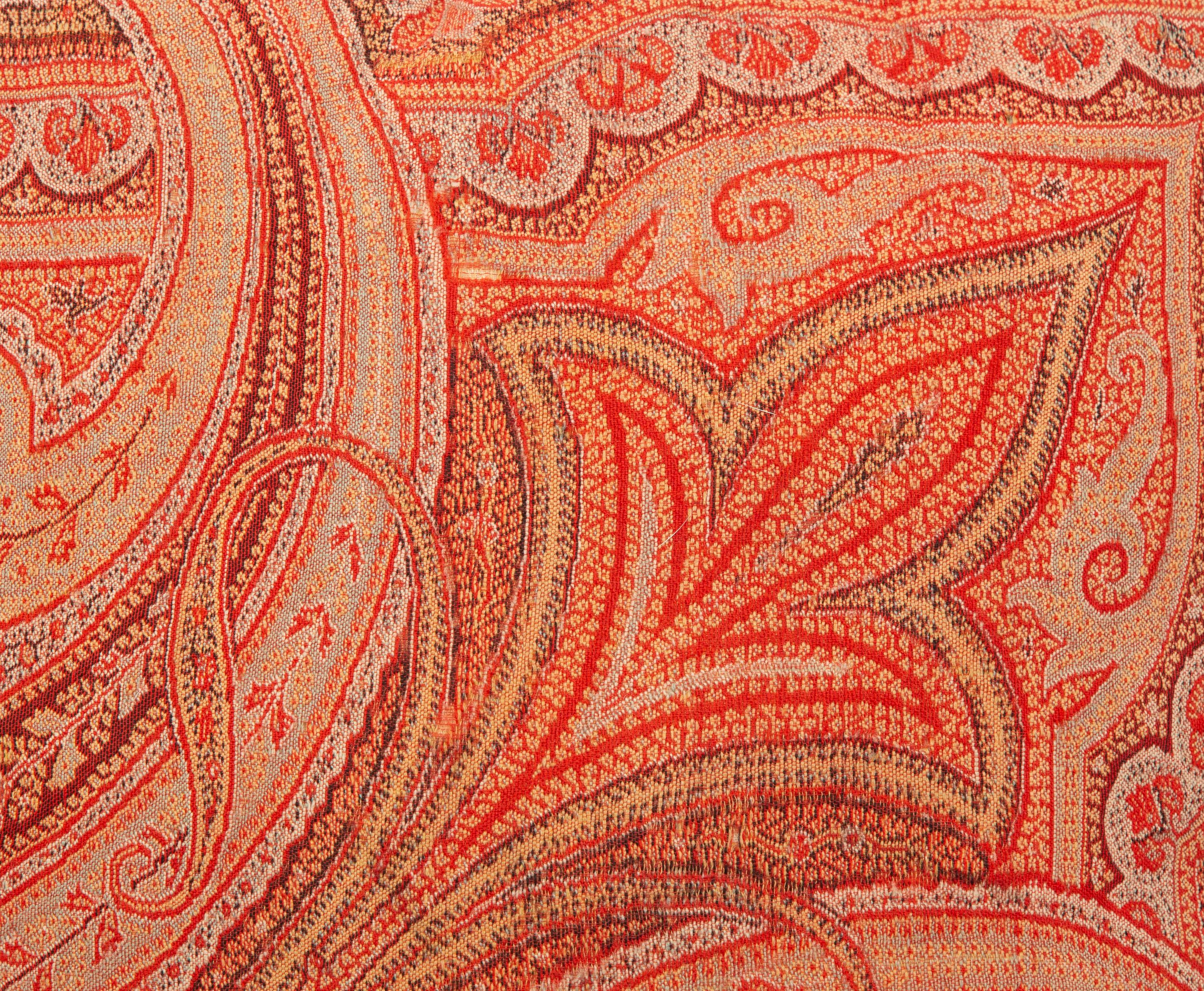 Four Paisley Covered Pillows with Black Braid Trim