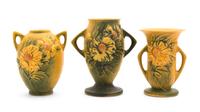 Three Roseville Peony Pottery Vases Height of tallest 7 1/4 inches.