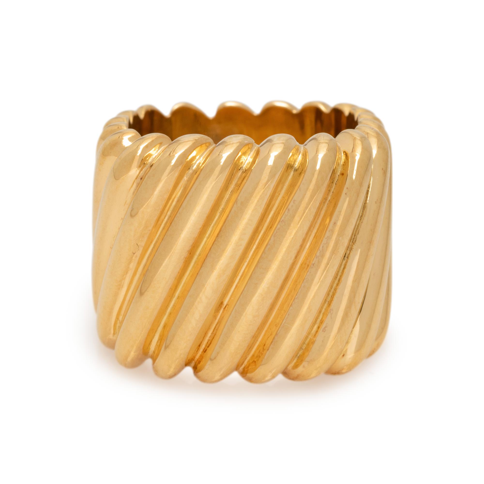 SCHLUGER, YELLOW GOLD RING