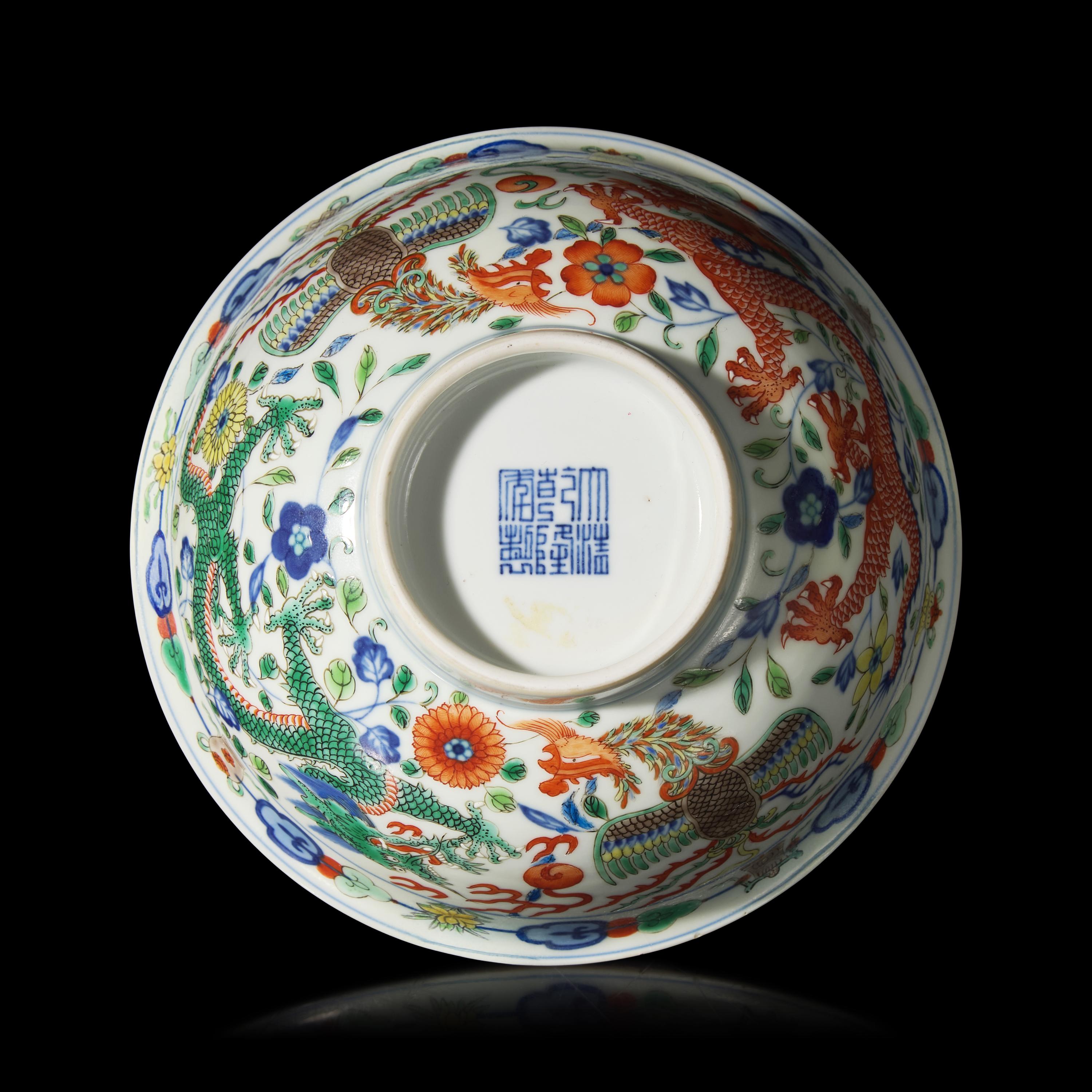 A Chinese Wucai Porcelain 'Dragon and Phoenix' Bowl, Qianlong Mark and of The Period 清乾隆 五彩龍鳳紋宮盌