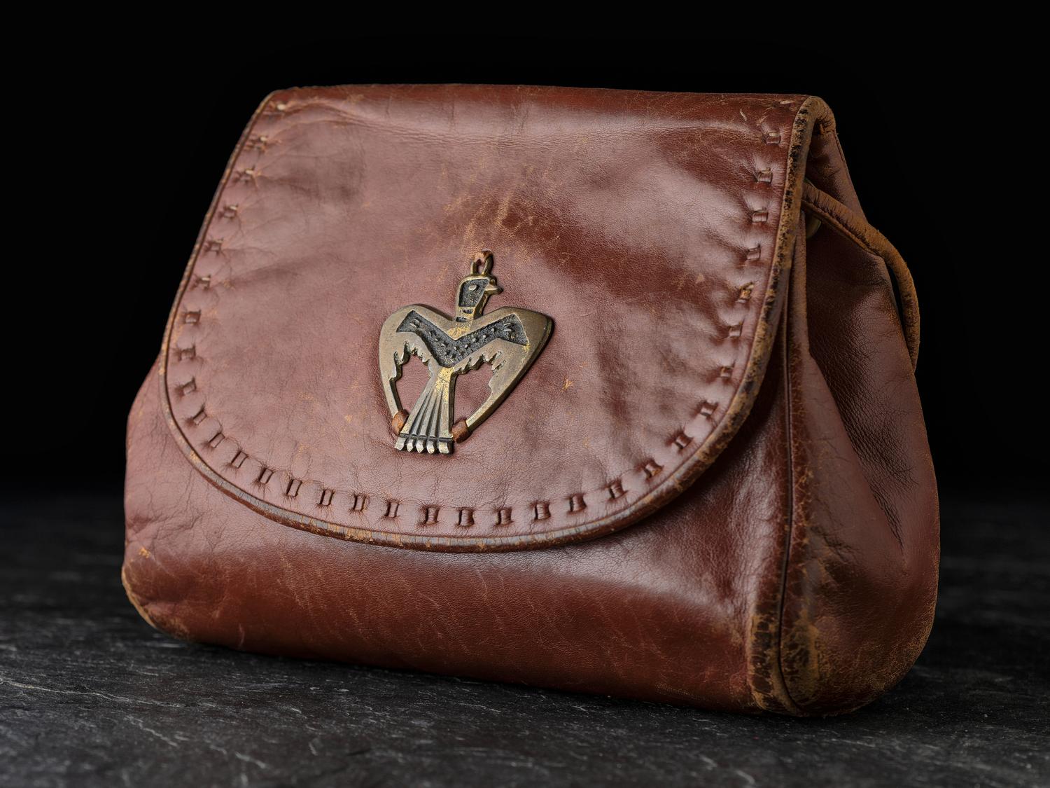 Brown Leather Drawstring Purse, with Brass Thunderbird