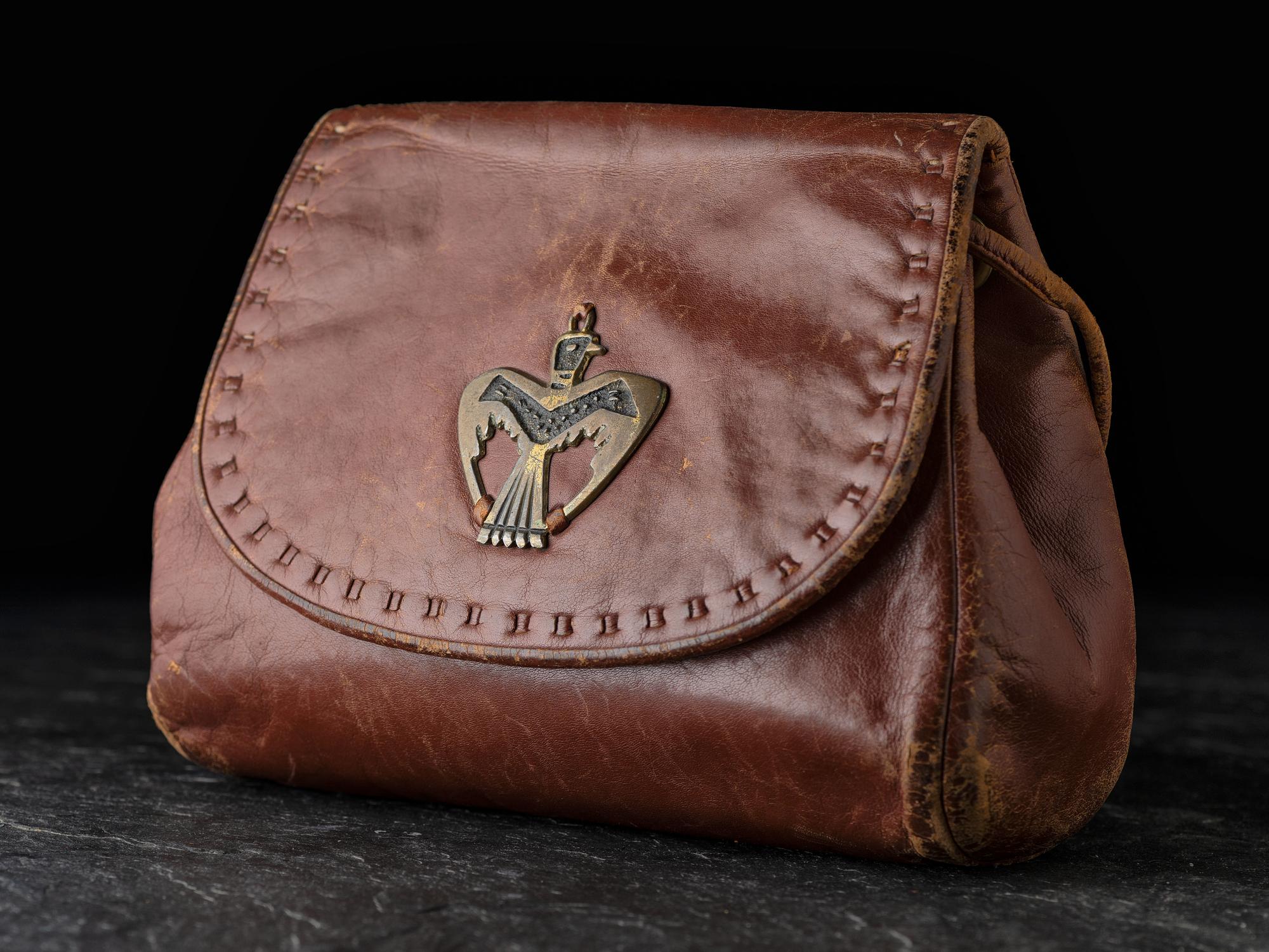 Brown Leather Drawstring Purse, with Brass Thunderbird