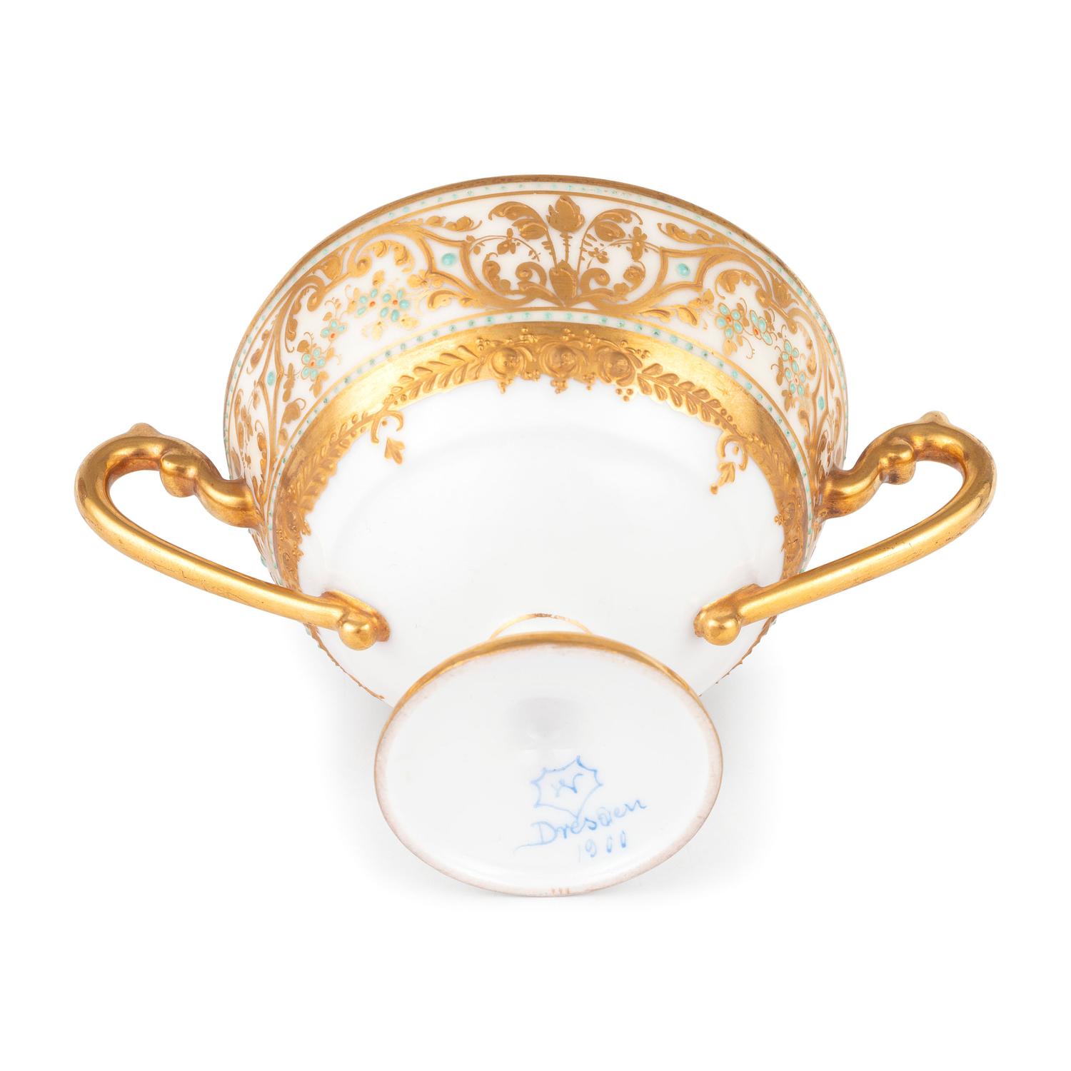 A Dresden Parcel-Gilt Monogrammed Porcelain Dinner Service, Plus