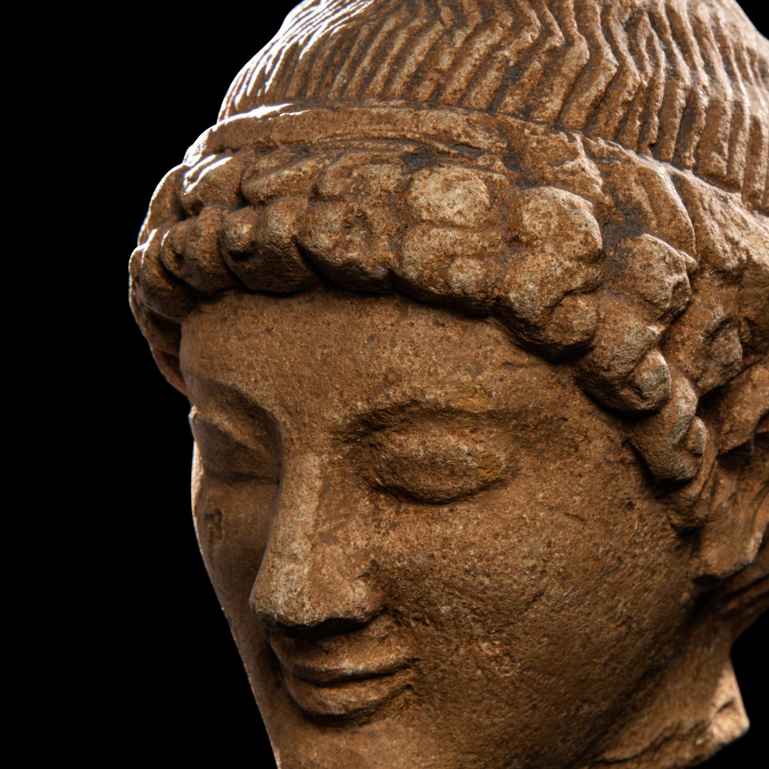 A Cypriot Limestone Head of a Youth