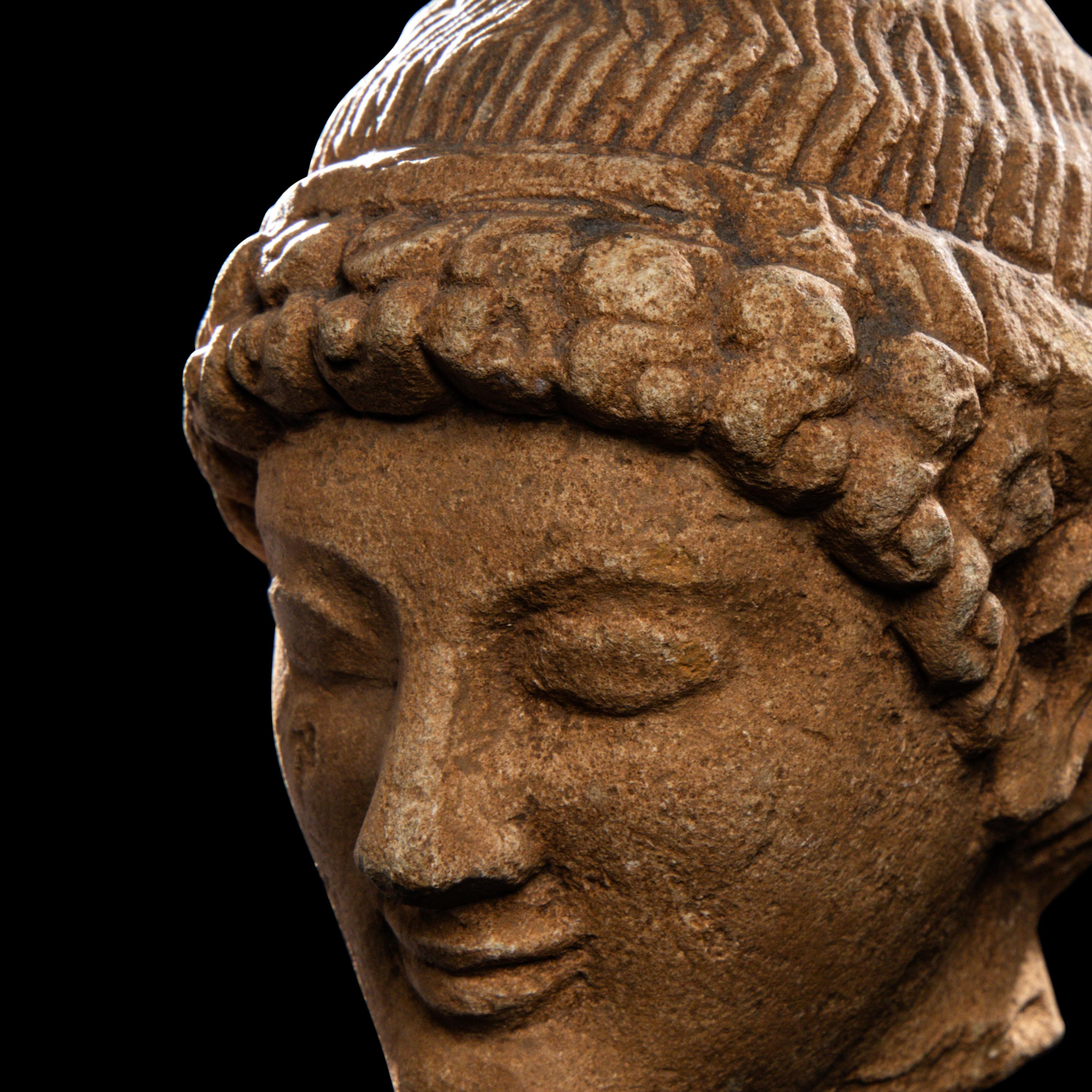 A Cypriot Limestone Head of a Youth