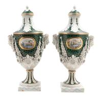 A Pair of English Porcelain Covered Urns, retailed by Ovington Brothers, Height overall 14 1/2 inches.