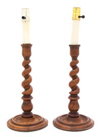 A Pair of English Walnut Barley Twist Candlestick Lamp Bases Height of candlestick 13 1/4 inches. — 20TH CENTURY