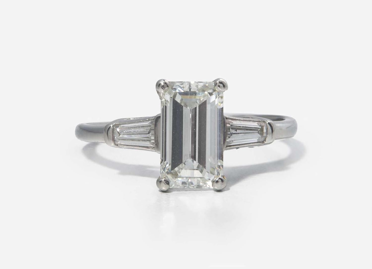 A Platinum and Diamond Ring with Ring Guards, 1.61 Carat Emerald-Cut Diamond, GIA Certified