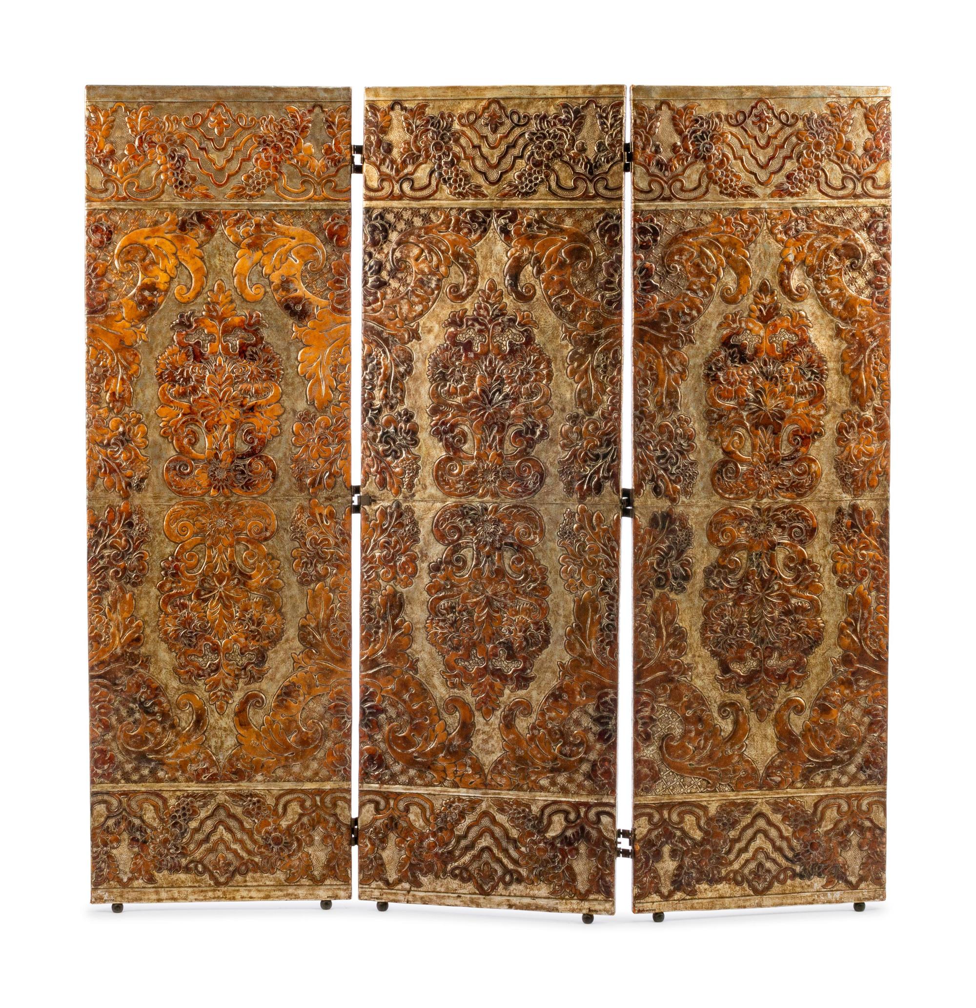 A Spanish Embossed Leather Three-Panel Floor Screen