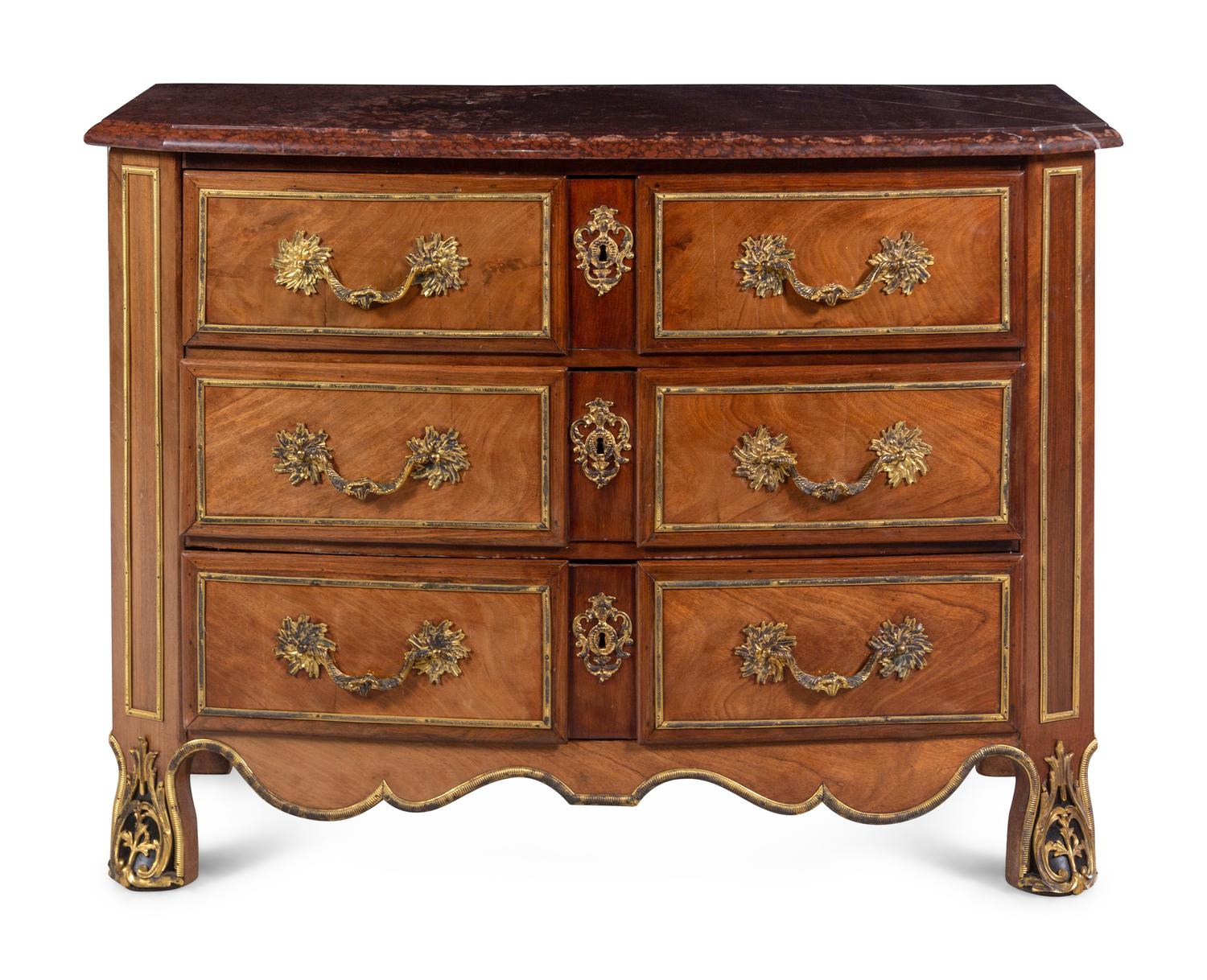 A Continental Gilt Bronze Mounted Mahogany Marble-Top Commode