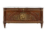A Louis XVI Style Gilt Bronze Mounted Mahogany Marble-Top Commode à Vantaux, after the Model by Guillaume Benneman