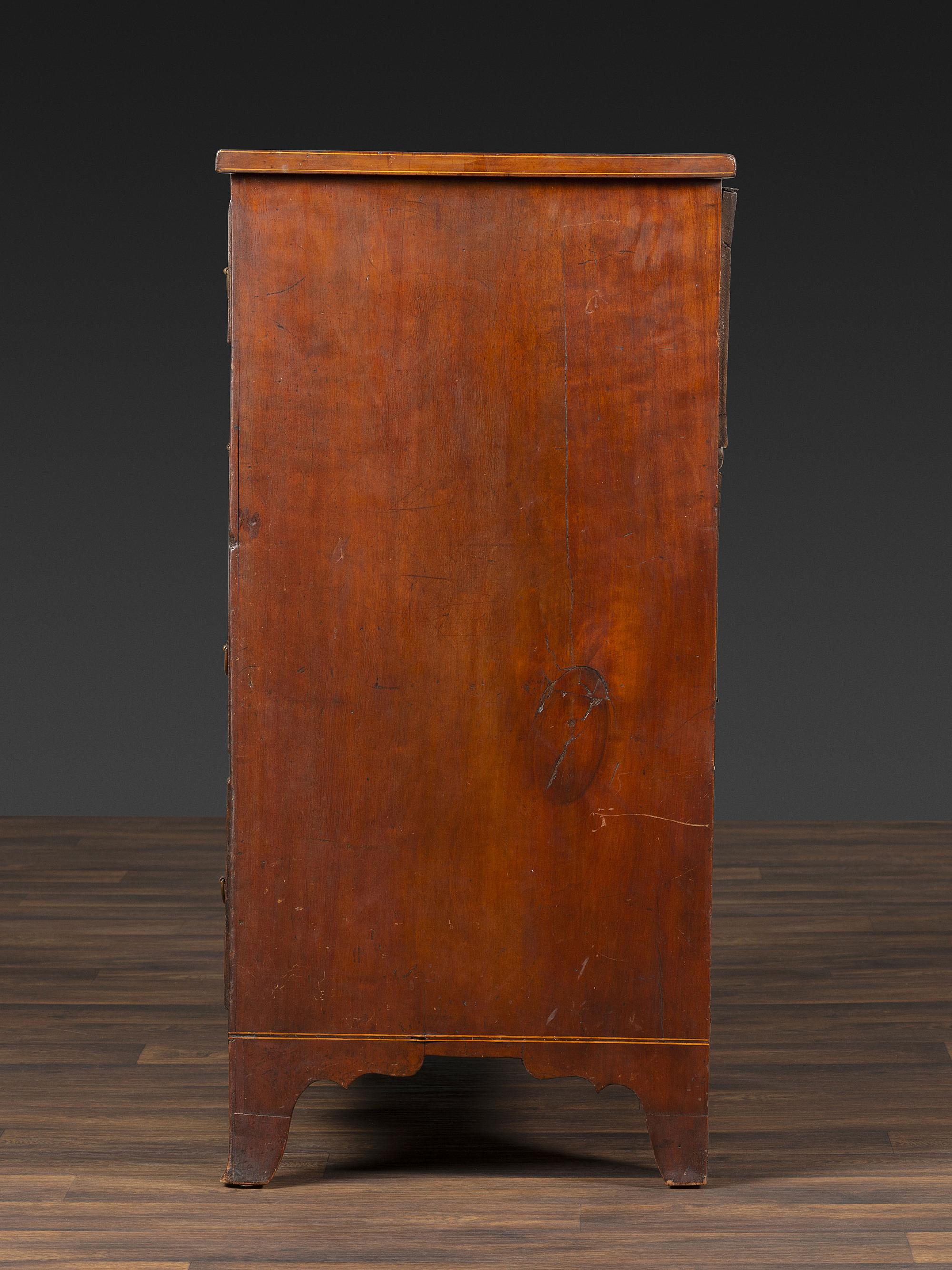 A Federal Bookend, Vine and Leaf Inlaid Cherrywood Chest of Drawers